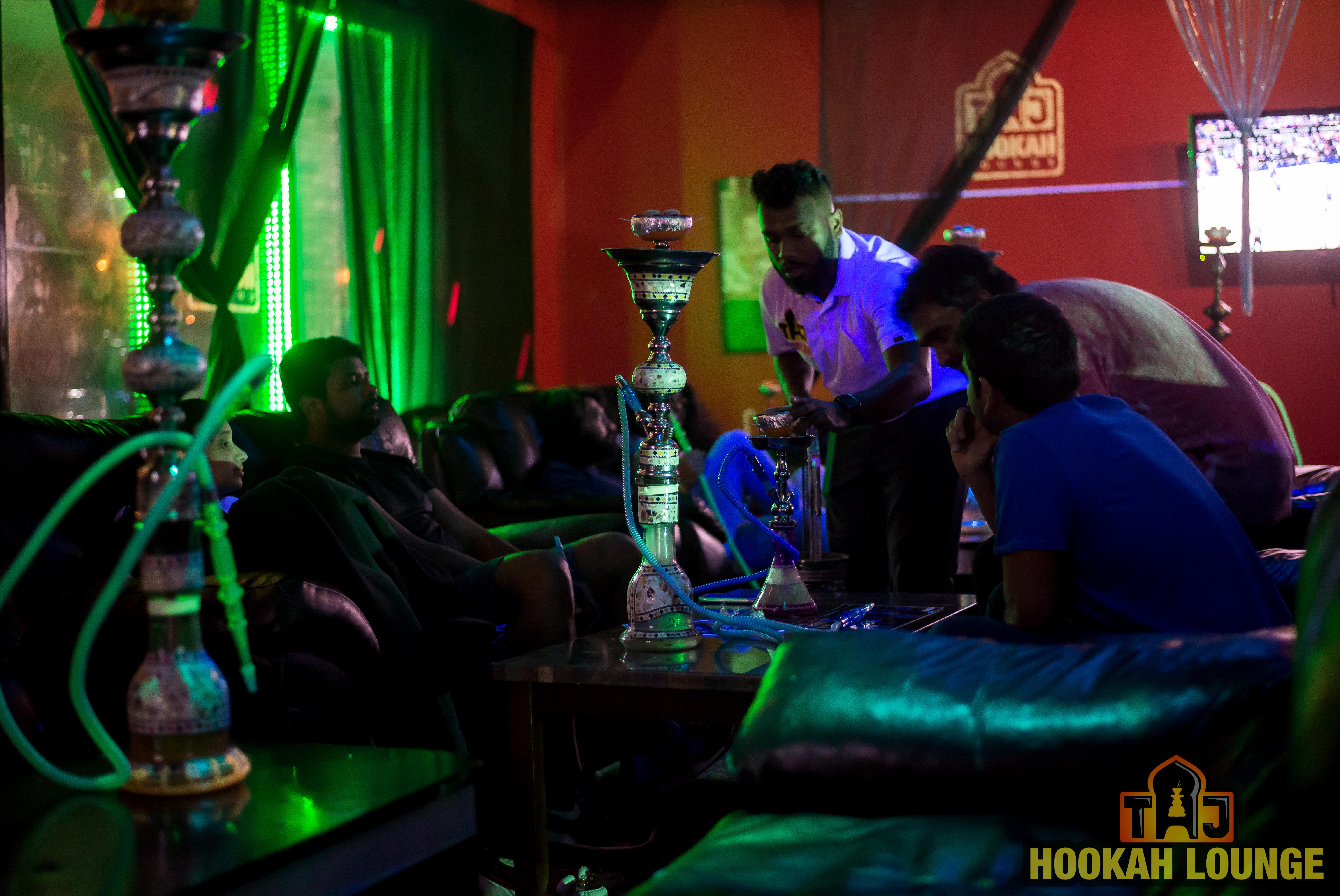 Customers enjoying premium hookah experience